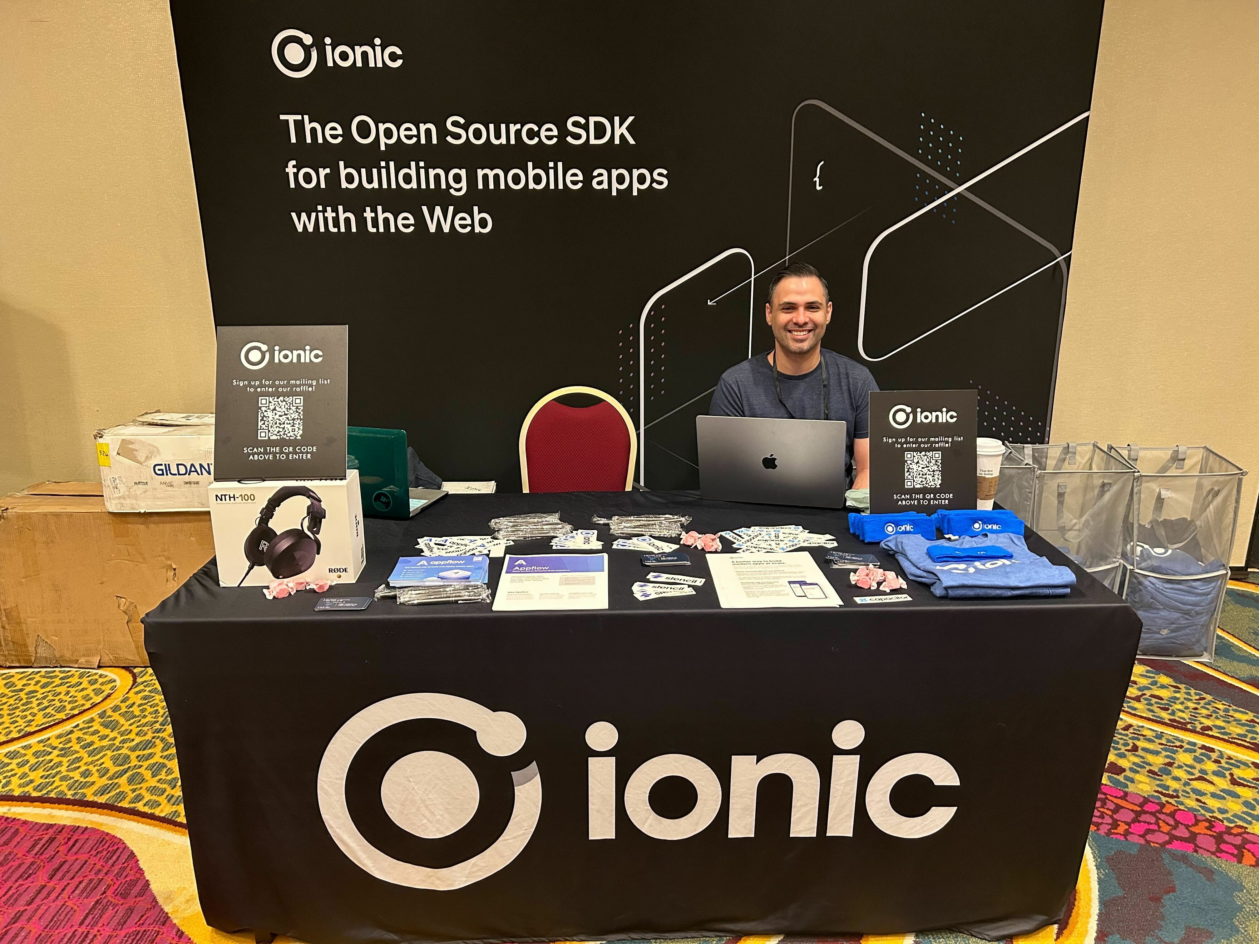 Developer Advocate Logan Brade at the sponsor booth at React Rally